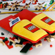 Illustration for article titled Lego Made Extra Cushy Slippers For Preventing Brick-Related Foot Injuries